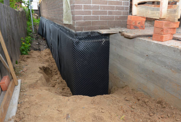 Happy homeowners after waterproofing job in Warsaw